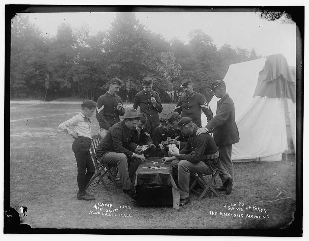 A photo from 1893 shows soldiers playing poker around a tent