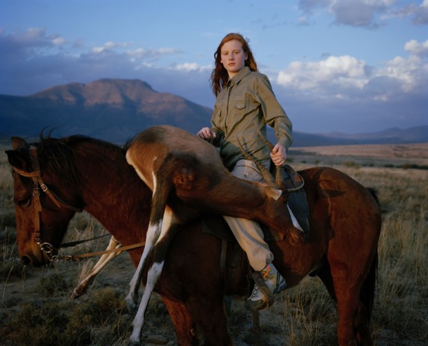 "Huntress with buck, south africa" by David Chancellor, from the series Hunters