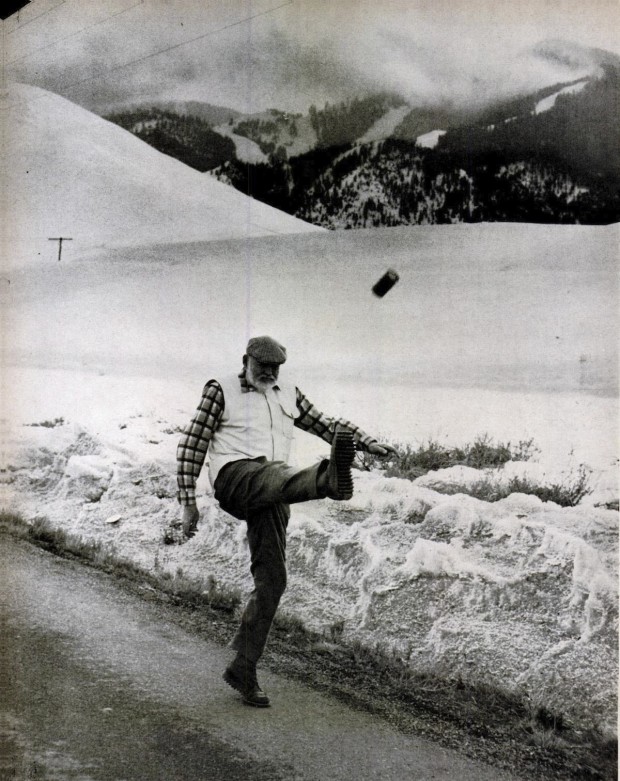 Ernest Hemingway kicking a can of beer, by John Bryson, February 1st, 1959.