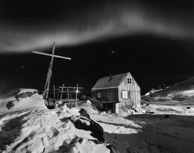 “The Northern Lights glow above Tinnittaqilaq village” by Ragnar Axelsson from the series Greenland, 2004. Captions retrieved from NYTimes.com © Ragnar Axelsson. Used with permission.