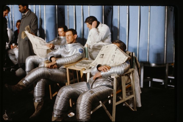 Photo from the production of Stanley Kubrick’s 2001: A Space Odyssey depicting The cast of the moon excavation crew on a break from filming.