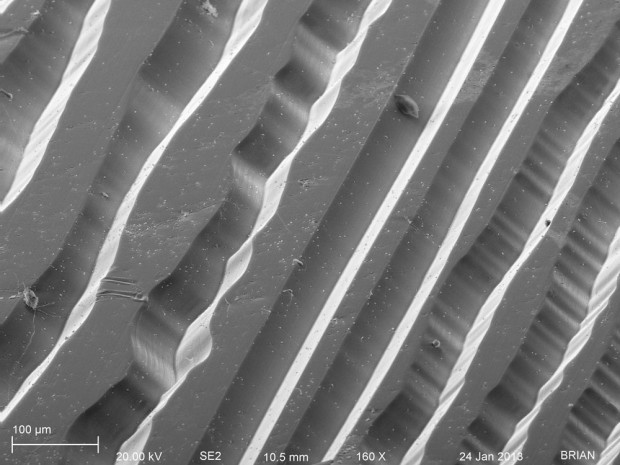 Vinyl Record Grooves (B): micrograph produced by a scanning electron microscope. Image courtesy of University of Rochester: URnano.