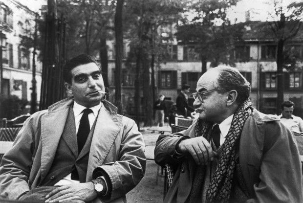 “FRANCE. Paris. Montmartre. Place du Tertre. 1952. The photographers Robert CAPA (left) and David SEYMOUR (Chim)”. Photo by Henri Cartier-Bresson, 1952. Magnum Image Reference HCB1952014W0000X/X01 (PAR165243) © Henri Cartier-Bresson/Magnum Photos