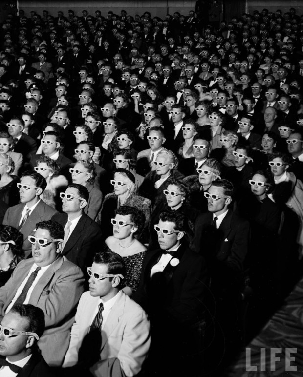 “Full frame of movie audience wearing special 3D glasses to view film <em>Bwana Devil</em> which was shot with new “natural vision” 3 dimensional technology.” photo by J.R. Eyerman, Paramount Theater, Hollywood, California, November 26, 1952