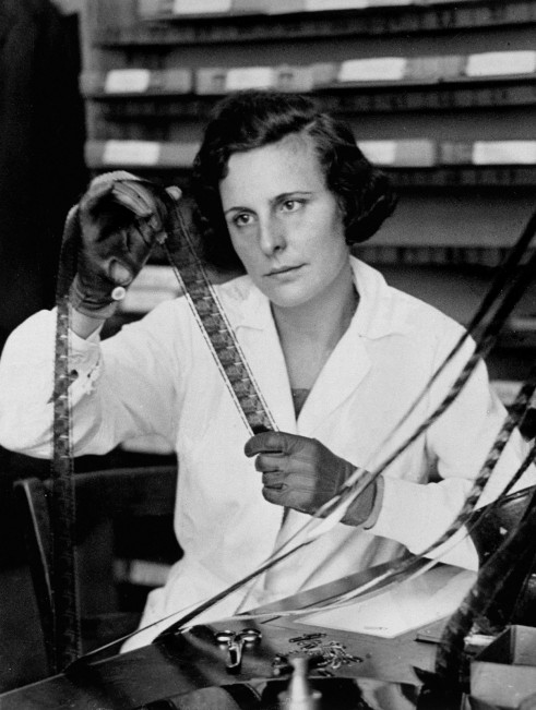 German director Leni Riefenstahl editing a film, c. 1935.